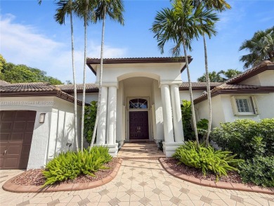 Welcome Home! This spectacular residence, boasting a lake and on Weston Hills Country Club in Florida - for sale on GolfHomes.com, golf home, golf lot