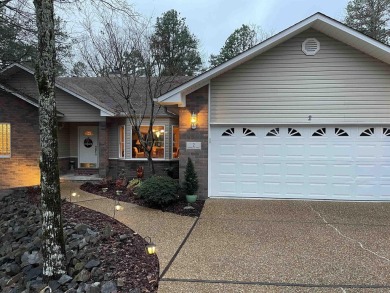 Great curb appeal with additional landscaping in this on Ponce De Leon Golf Course in Arkansas - for sale on GolfHomes.com, golf home, golf lot