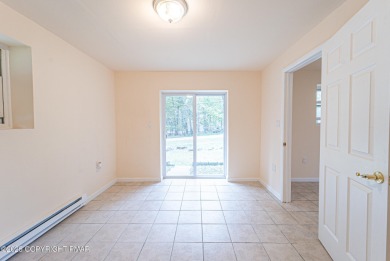 CHARMING UPGRADED POCONOS CHALET Completely Updated 3BR 2.5BA on Pocono Farms Country Club in Pennsylvania - for sale on GolfHomes.com, golf home, golf lot