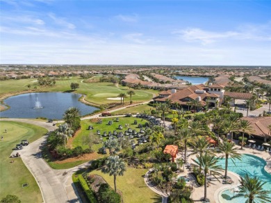 Experience resort-style living every day in this beautifully on Esplanade Golf and Country at Lakewood Ranch in Florida - for sale on GolfHomes.com, golf home, golf lot