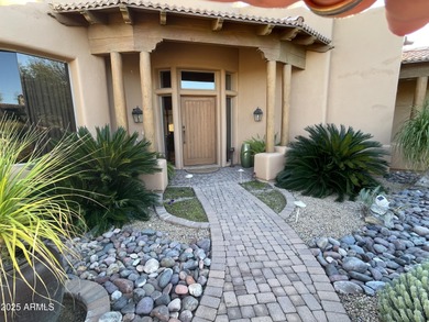 This exceptional turnkey residence is situated in Pinnacle on  in Arizona - for sale on GolfHomes.com, golf home, golf lot