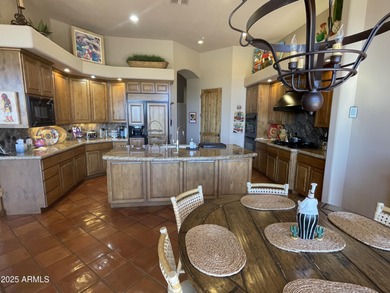 This exceptional turnkey residence is situated in Pinnacle on  in Arizona - for sale on GolfHomes.com, golf home, golf lot
