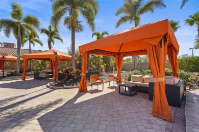 Experience resort-style living every day in this beautifully on Esplanade Golf and Country at Lakewood Ranch in Florida - for sale on GolfHomes.com, golf home, golf lot
