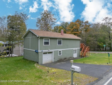 CHARMING UPGRADED POCONOS CHALET Completely Updated 3BR 2.5BA on Pocono Farms Country Club in Pennsylvania - for sale on GolfHomes.com, golf home, golf lot