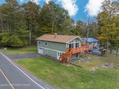 CHARMING UPGRADED POCONOS CHALET Completely Updated 3BR 2.5BA on Pocono Farms Country Club in Pennsylvania - for sale on GolfHomes.com, golf home, golf lot