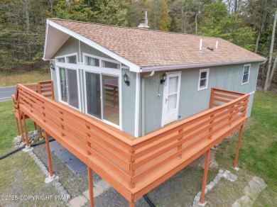 CHARMING UPGRADED POCONOS CHALET Completely Updated 3BR 2.5BA on Pocono Farms Country Club in Pennsylvania - for sale on GolfHomes.com, golf home, golf lot