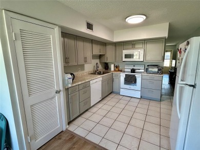 Welcome to this meticulously maintained 2 bed, 2 bath oasis on On Top Of The World Golf Course in Florida - for sale on GolfHomes.com, golf home, golf lot
