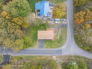CHARMING UPGRADED POCONOS CHALET Completely Updated 3BR 2.5BA on Pocono Farms Country Club in Pennsylvania - for sale on GolfHomes.com, golf home, golf lot