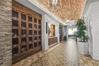 Experience resort-style living every day in this beautifully on Esplanade Golf and Country at Lakewood Ranch in Florida - for sale on GolfHomes.com, golf home, golf lot