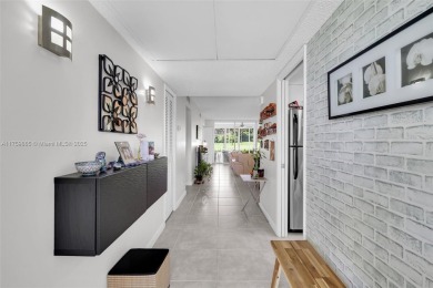 Welcome to this beautifully remodeled 2-bedroom, 2-bathroom on Palm-Aire Country Club and Resort - Palms in Florida - for sale on GolfHomes.com, golf home, golf lot
