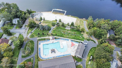 CHARMING UPGRADED POCONOS CHALET Completely Updated 3BR 2.5BA on Pocono Farms Country Club in Pennsylvania - for sale on GolfHomes.com, golf home, golf lot