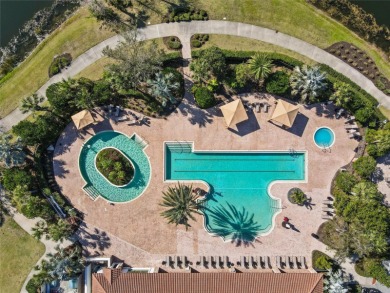 Experience resort-style living every day in this beautifully on Esplanade Golf and Country at Lakewood Ranch in Florida - for sale on GolfHomes.com, golf home, golf lot