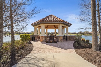 Experience resort-style living every day in this beautifully on Esplanade Golf and Country at Lakewood Ranch in Florida - for sale on GolfHomes.com, golf home, golf lot