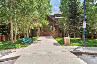 Tucked within a serene enclave of mature Aspens and beautifully on Breckenridge Golf Club in Colorado - for sale on GolfHomes.com, golf home, golf lot