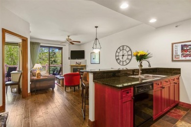 Tucked within a serene enclave of mature Aspens and beautifully on Breckenridge Golf Club in Colorado - for sale on GolfHomes.com, golf home, golf lot