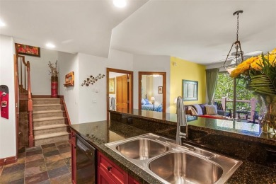 Tucked within a serene enclave of mature Aspens and beautifully on Breckenridge Golf Club in Colorado - for sale on GolfHomes.com, golf home, golf lot