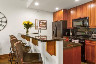 Tucked within a serene enclave of mature Aspens and beautifully on Breckenridge Golf Club in Colorado - for sale on GolfHomes.com, golf home, golf lot
