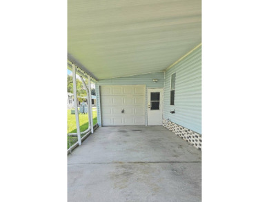 Furnished, spacious 2 bedroom 2 bath home in 55 + Resort style on Zephyrhills Municipal Golf Course in Florida - for sale on GolfHomes.com, golf home, golf lot