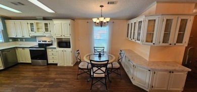 Furnished, spacious 2 bedroom 2 bath home in 55 + Resort style on Zephyrhills Municipal Golf Course in Florida - for sale on GolfHomes.com, golf home, golf lot