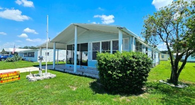 Furnished, spacious 2 bedroom 2 bath home in 55 + Resort style on Zephyrhills Municipal Golf Course in Florida - for sale on GolfHomes.com, golf home, golf lot
