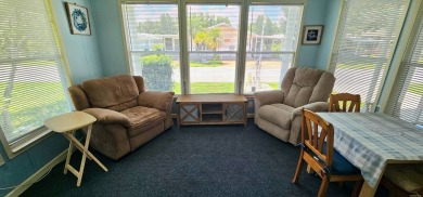 Furnished, spacious 2 bedroom 2 bath home in 55 + Resort style on Zephyrhills Municipal Golf Course in Florida - for sale on GolfHomes.com, golf home, golf lot