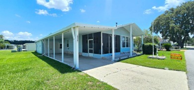 Furnished, spacious 2 bedroom 2 bath home in 55 + Resort style on Zephyrhills Municipal Golf Course in Florida - for sale on GolfHomes.com, golf home, golf lot