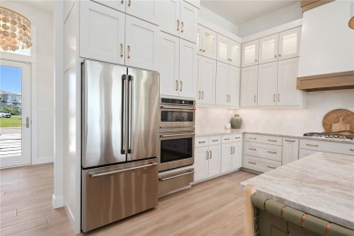 This newly completed waterfront home located in the prestigious on Lamar Golf Course in Texas - for sale on GolfHomes.com, golf home, golf lot