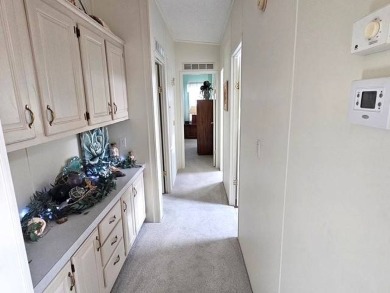 Welcome Home to this beautiful well-maintained 2-bedroom, 2-bath on Crystal Lake Club in Florida - for sale on GolfHomes.com, golf home, golf lot