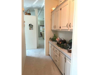 Welcome Home to this beautiful well-maintained 2-bedroom, 2-bath on Crystal Lake Club in Florida - for sale on GolfHomes.com, golf home, golf lot