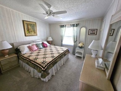 Welcome Home to this beautiful well-maintained 2-bedroom, 2-bath on Crystal Lake Club in Florida - for sale on GolfHomes.com, golf home, golf lot