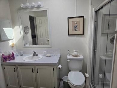 Welcome Home to this beautiful well-maintained 2-bedroom, 2-bath on Crystal Lake Club in Florida - for sale on GolfHomes.com, golf home, golf lot