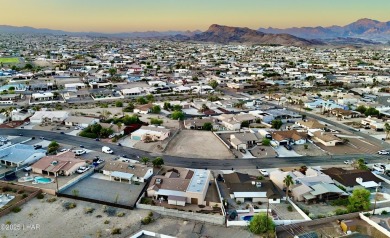 This beautifully prepped lot on War Eagle Dr has been graded on London Bridge Golf Course in Arizona - for sale on GolfHomes.com, golf home, golf lot