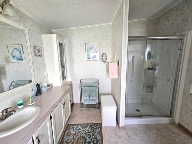Welcome Home to this beautiful well-maintained 2-bedroom, 2-bath on Crystal Lake Club in Florida - for sale on GolfHomes.com, golf home, golf lot