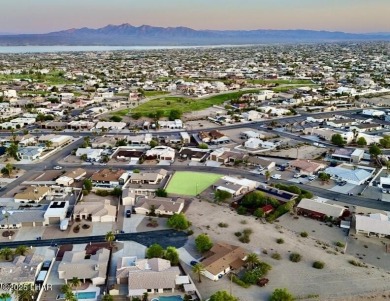 This beautifully prepped lot on War Eagle Dr has been graded on London Bridge Golf Course in Arizona - for sale on GolfHomes.com, golf home, golf lot