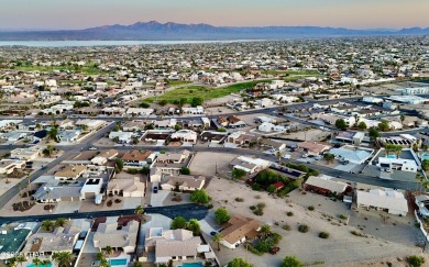 This beautifully prepped lot on War Eagle Dr has been graded on London Bridge Golf Course in Arizona - for sale on GolfHomes.com, golf home, golf lot