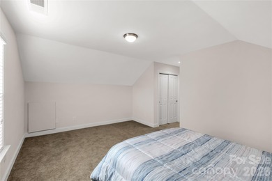 Effortless living in this beautifully maintained 3-bedroom on Emerald Lake Golf Club in North Carolina - for sale on GolfHomes.com, golf home, golf lot