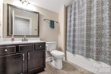 Effortless living in this beautifully maintained 3-bedroom on Emerald Lake Golf Club in North Carolina - for sale on GolfHomes.com, golf home, golf lot