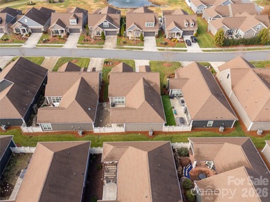 Effortless living in this beautifully maintained 3-bedroom on Emerald Lake Golf Club in North Carolina - for sale on GolfHomes.com, golf home, golf lot