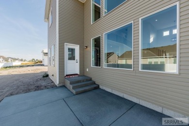 Situated on 0.29 acres, its brand-new faade exudes modern on Sage Lakes Municipal Golf Course in Idaho - for sale on GolfHomes.com, golf home, golf lot