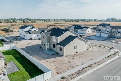 Situated on 0.29 acres, its brand-new faade exudes modern on Sage Lakes Municipal Golf Course in Idaho - for sale on GolfHomes.com, golf home, golf lot