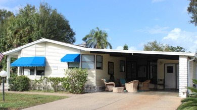 This charming, fully furnished 2-bedroom home sits in a friendly on Schalamar Creek Golf and Country Club in Florida - for sale on GolfHomes.com, golf home, golf lot