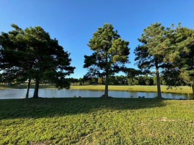 This beautiful golf and water view homesite is located in the on Bay Creek Golf Club in Virginia - for sale on GolfHomes.com, golf home, golf lot