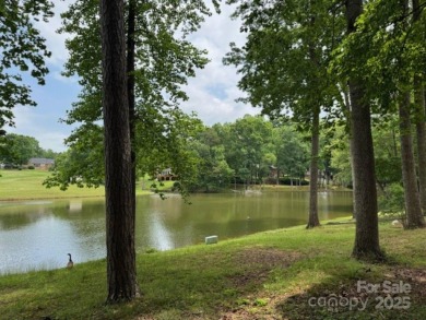 A wonderful golf lot next to the green and overlooking the lake on Cherryville Golf and  Country Club in North Carolina - for sale on GolfHomes.com, golf home, golf lot