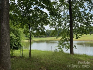 A wonderful golf lot next to the green and overlooking the lake on Cherryville Golf and  Country Club in North Carolina - for sale on GolfHomes.com, golf home, golf lot