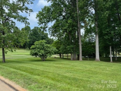 A wonderful golf lot next to the green and overlooking the lake on Cherryville Golf and  Country Club in North Carolina - for sale on GolfHomes.com, golf home, golf lot