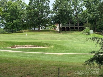 A wonderful golf lot next to the green and overlooking the lake on Cherryville Golf and  Country Club in North Carolina - for sale on GolfHomes.com, golf home, golf lot