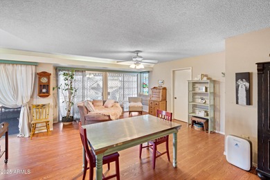 Welcome to this charming two-bedroom, two-bath home in the on Sun City Riverview Golf Course in Arizona - for sale on GolfHomes.com, golf home, golf lot