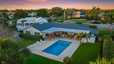 Welcome to 1104 Country Club Circle, a stunning and fully on North Palm Beach Country Club in Florida - for sale on GolfHomes.com, golf home, golf lot