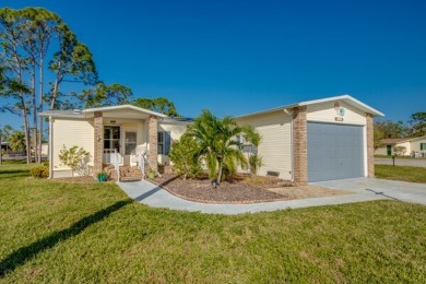 Move-in ready and beautifully furnished, this two-bedroom on Pine Lakes Country Club in Florida - for sale on GolfHomes.com, golf home, golf lot