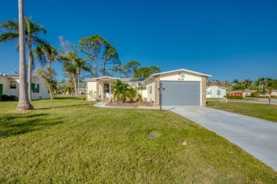 Move-in ready and beautifully furnished, this two-bedroom on Pine Lakes Country Club in Florida - for sale on GolfHomes.com, golf home, golf lot